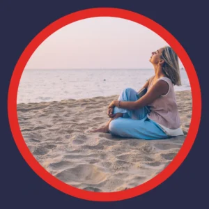 A woman relaxes on the beach. 