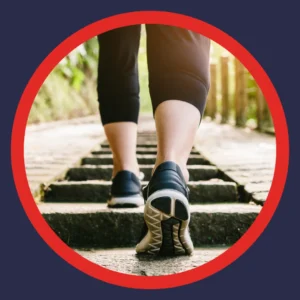 Feet walk up steps outdoor. 