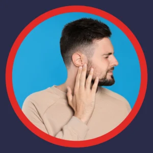 A man holds his ear. 