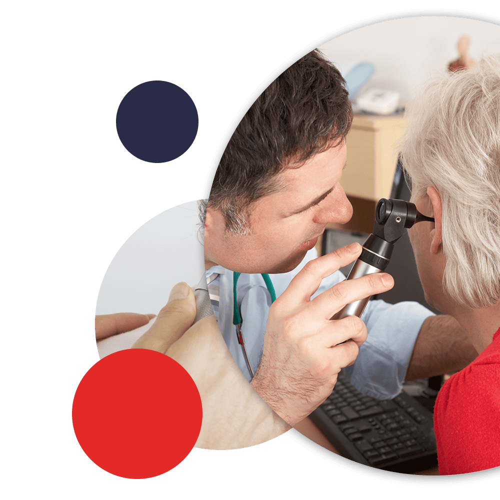 doctor looking into patient's ear