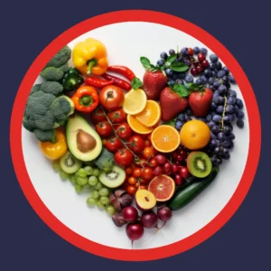 Fruits and vegetables sit on a heart shaped tray.
