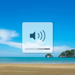 A volume symbol stands against a beautiful beach background. 