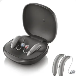Resound hearing aids sit in their case against a white background. 