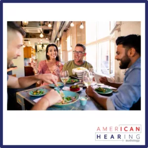 Friends enjoy a dinner out. 