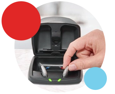 Pair of Starkey Hearing Aids Two Starkey hearing aids in the charger