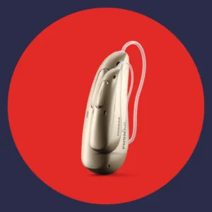 A Phonak Audeo Sphere Infinio hearing aid stands on a red background.