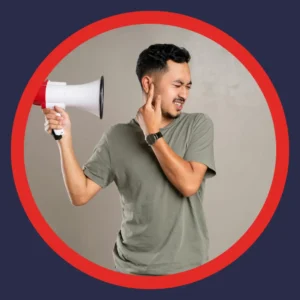 A man holds a megaphone to his ear. 