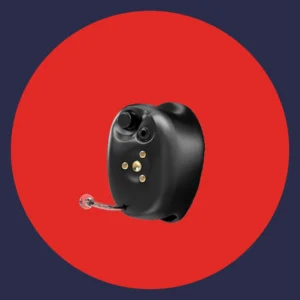 A Starkey Signature hearing aid rests on red background. 