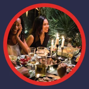 Friends enjoy a dinner party together. 