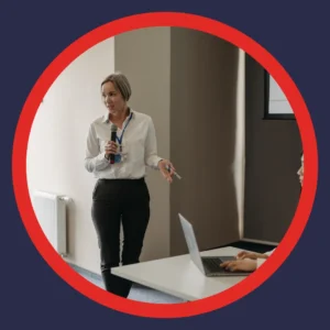 A speaker uses a microphone. 