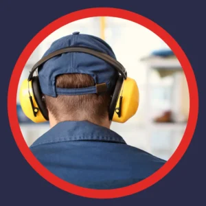 A man wears hearing protection. 